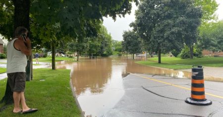 Burlington neighbourhood overwhelmed as torrential rain floods streets, yards, homes