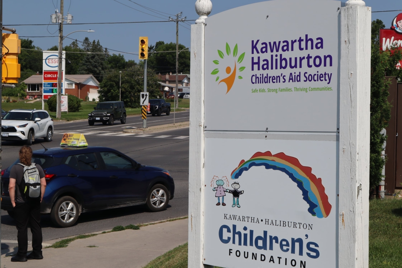 Photo shows the sign for the Kawartha Haliburton Children's Aid Society outside the agency's office on Chemong Road, Peterborough.