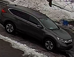 Black SUV with front License plate missing