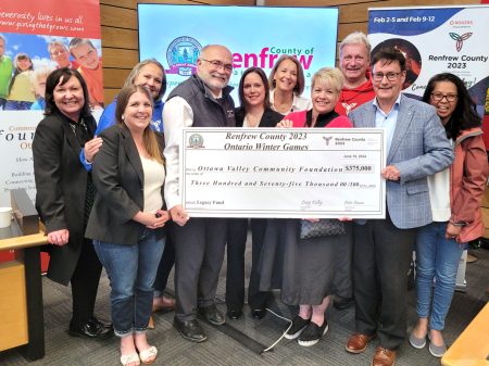 Group of people with large cheque - cheque presentation for Ontario Winter Games Legacy Fund