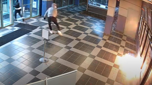 Video captures pair setting movie theatre ablaze in suspected arson Video captures pair setting movie theatre ablaze in suspected arson