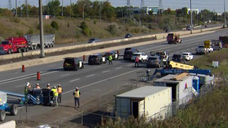 Provincial police investigate after a vehicle struck some construction equipment on Highway 403 in Burlington, seriously injuring a construction worker.