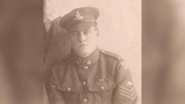 A sepia headshot of a soldier.