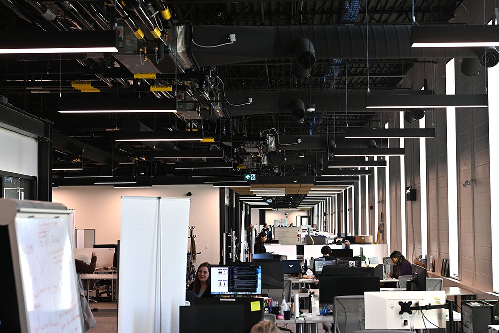 ia work area with desks and meeting spaces