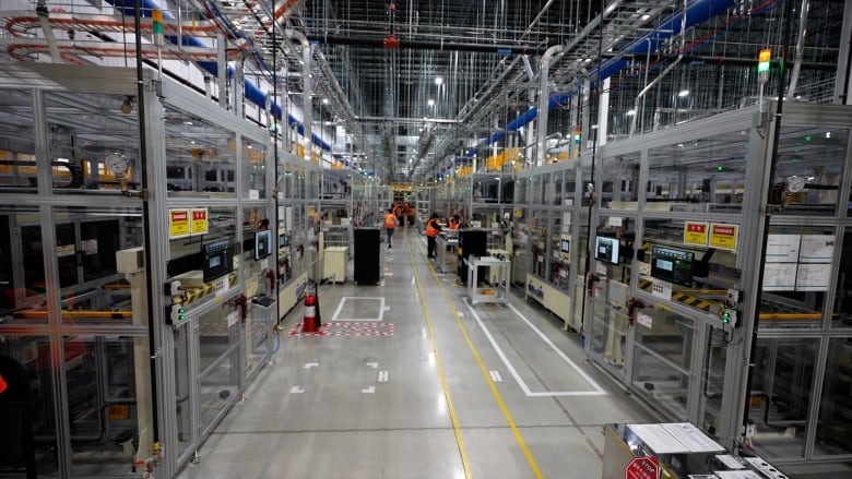 A look down a manufacturing aisle inside the Windsor, Ont., NextStar EV factory on the city's east side.