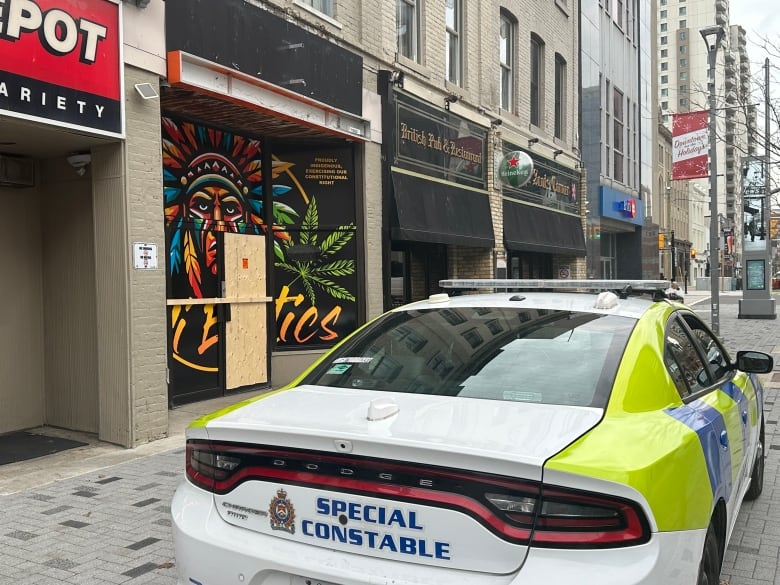 A special constable was stationed outside the business on Dundas Street Monday morning. 