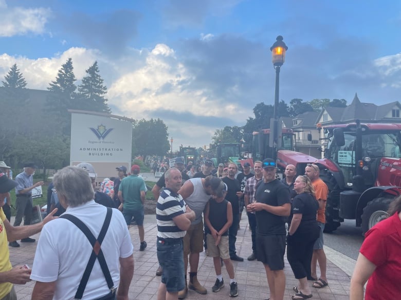Protesters outside a building.
