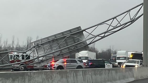 Truck driver charged after signal collapse closed Freeway 401 in Whitby, police say Truck driver charged after sign collapse closed Highway 401 in Whitby, police say