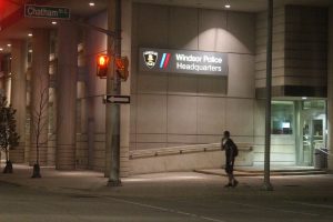 Man charged with murder after victim found in hospital parking lot