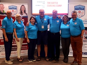 The organizing committee poses from a photo after an introductory press conference for The Battle between curling superstars Rachel Homan and Brad Jacobs to take place from Sept. 25 to 27, 2026, at The Plex in Port Elgin. Greg Cowan/The Sun Times