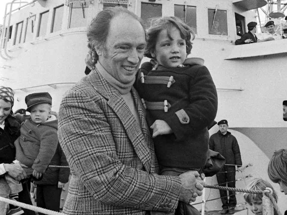  Prime Minister Pierre Elliott Trudeau walks off a boat in Port Alberni, B.C., while holding a four-year-old Justin Trudeau in May 1976.