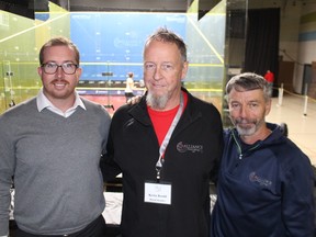 Gary Delavigne poses with Andrew Warder and Kevin Bradd at an event.