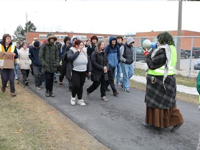 Students protesting while walking