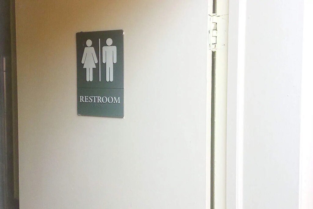 Custodian Charged with Voyeurism at Ontario Factory