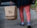 A customer carries an Olive Garden bag Pittsburg Calif.