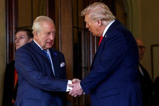 US president Donald Trump shakes hands with Britain's King Charles, as Trump departs Windsor Castle, in Windsor, Britain, 18 September 2025