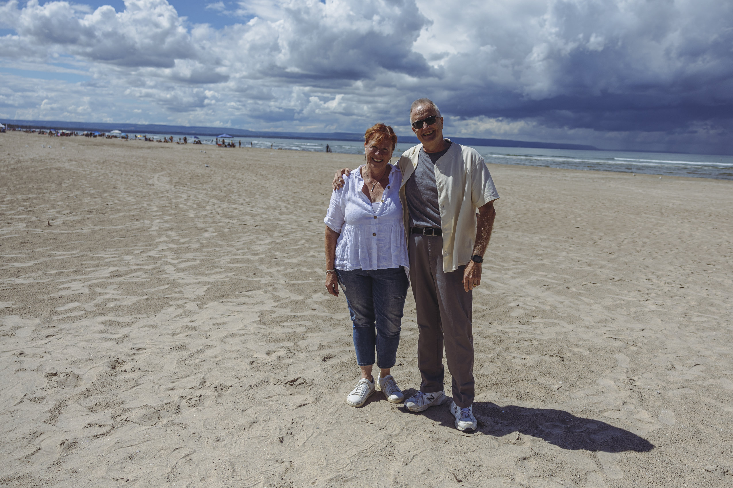 A couple from Wasaga Beach, Sylvia Bray and Mark Winegarden, pose for a photo on the beach.
