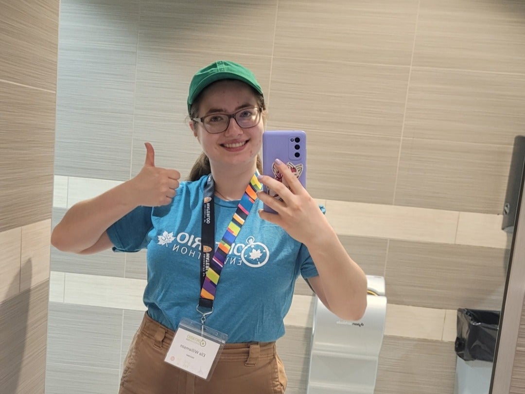 Ella giving a thumbs up.