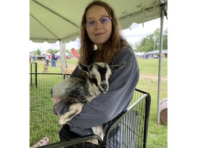 woman and goat