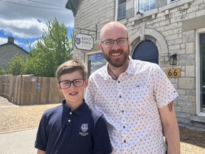 boy and teacher outside of school