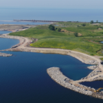Offshore breakwater islands help protect and shape the restored shoreline..