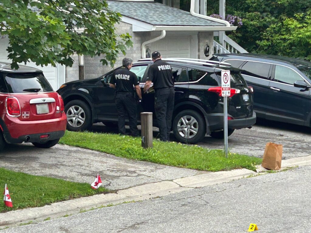 Police investigate a shooting near Wellington Street and Mc Donald Drive in Aurora on June 26, 2026
