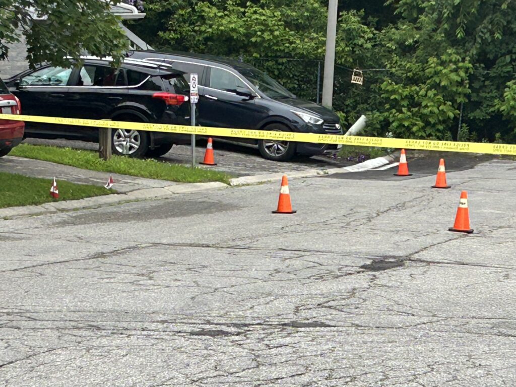 Police investigate a shooting near Wellington Street and Mc Donald Drive in Aurora on June 26, 2026