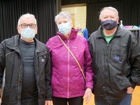 Art and Bev Surette, on left side Mat Weber right among those displaced Monday due housing issues stemming blaze brought concern town officials including nearby citizens police officers assisting local needs. Cris Abbott Norfolk tillsonb news)