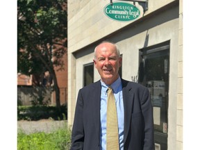 man in front of building