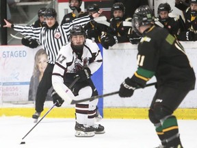 Chatha M ar ons 'Xandr e Aik t en(17)isde fendedby St. Thomas Stars' Rory Savage (11)at Cha tham Memorial Arena i n Cha tham, O nt., o n Sun day, M arch15 ,2026. Mark Ma lone/C hat ham Da ily N ews/P ostmedi a Net work
