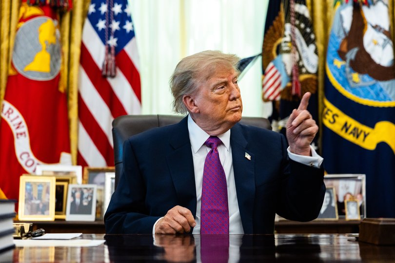 President Donald Trump takes a question from a reporter after signing an executive order to change the name of Lake Ontario to Lake America in the Oval Office on Thursday Aug. 27, 2026. Trump said that the U. S. government had Òfiled all the necessary papers, documents,Ó and that the name change would take effect immediately. (Demetrius Freeman/The New York Times)