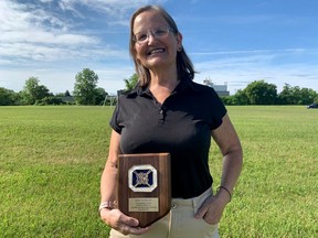 Local Rowing Coach Honored for Outstanding Achievements Local Rowing Coach Honored for Outstanding Achievements
