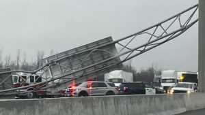 Truck Driver Faces Charges After Sign Collapse on Highway 401 Truck Driver Faces Charges After Sign Collapse on Highway 401