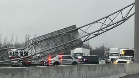 Truck Driver Faces Charges After Sign Collapse on Highway 401 Truck Driver Faces Charges After Sign Collapse on Highway 401