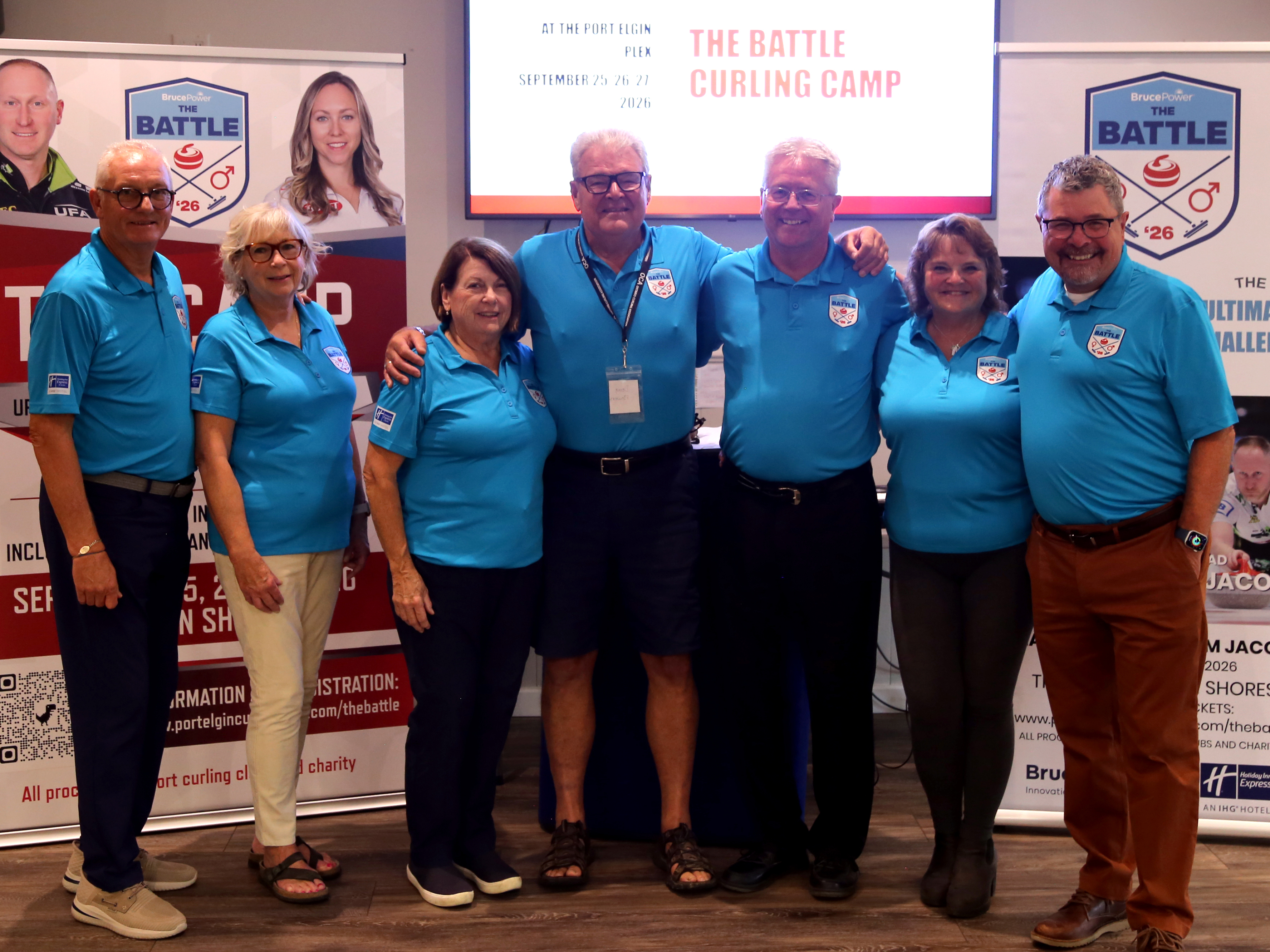 The organizing committee poses for a photo after an introductory press conference f or The Battle between curling superstars Rachel Homan and Brad Jacobs t o take place f rom Sept. 25 t o 27 , 2026 , at The Plex i n Port Elgin. Greg Cowan/The Sun Times