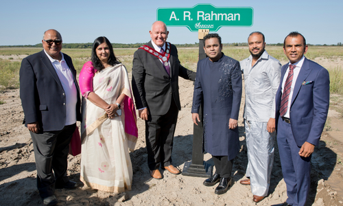 Mayor Frank Scarpitti, Councillor Khalid Usman, A. R. Rahman and members of delegation on-site at future A. R. Rahman Street location.